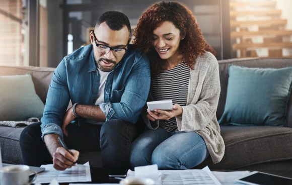Couple budgeting together 