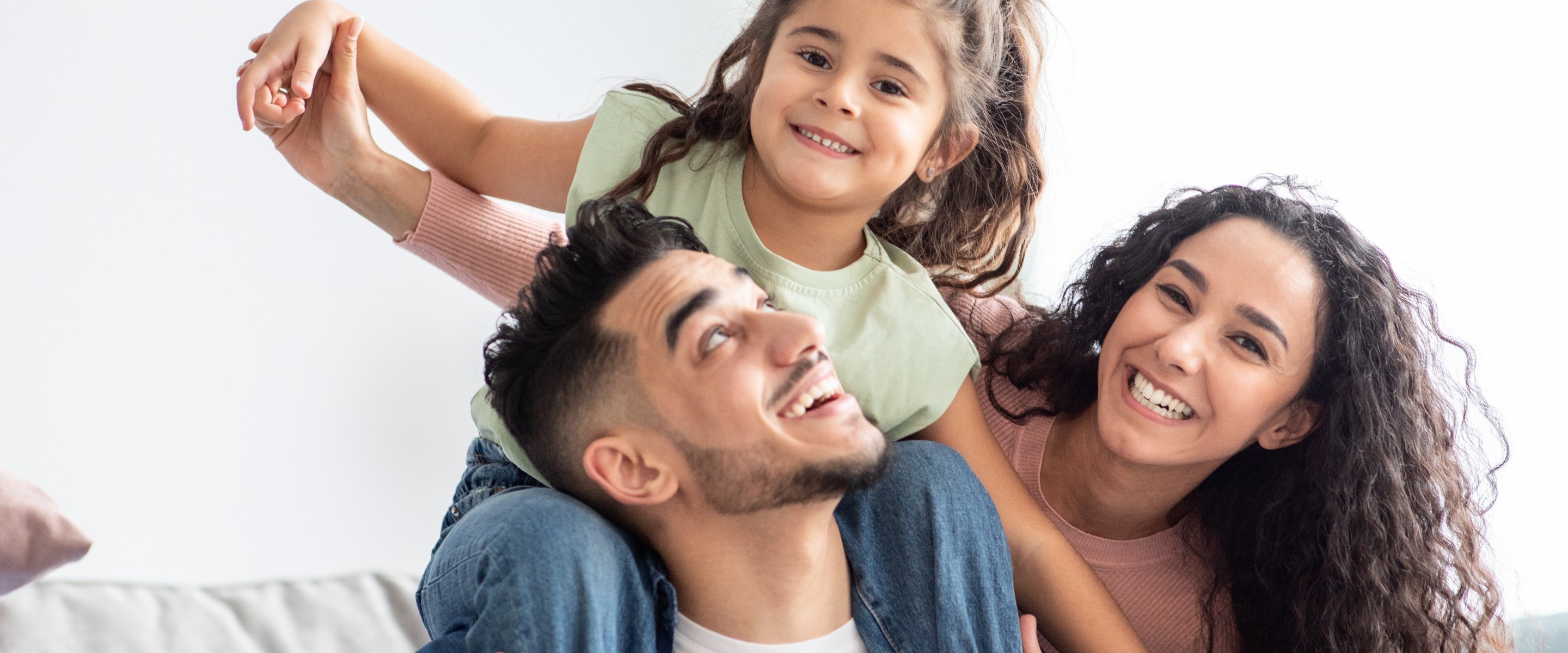 Young Latino family of three.