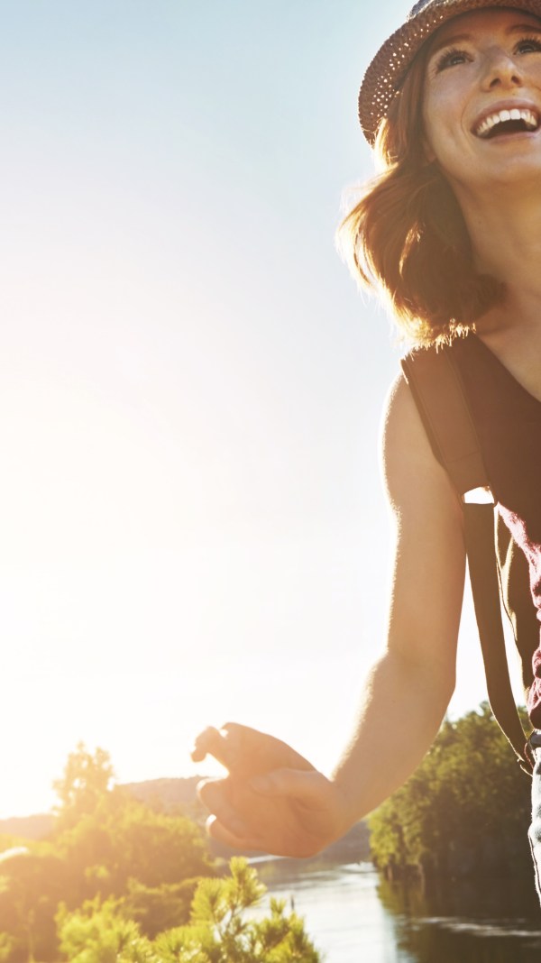 Woman hiking in nice weather.