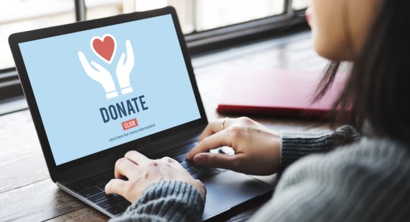 Woman making a donation online
