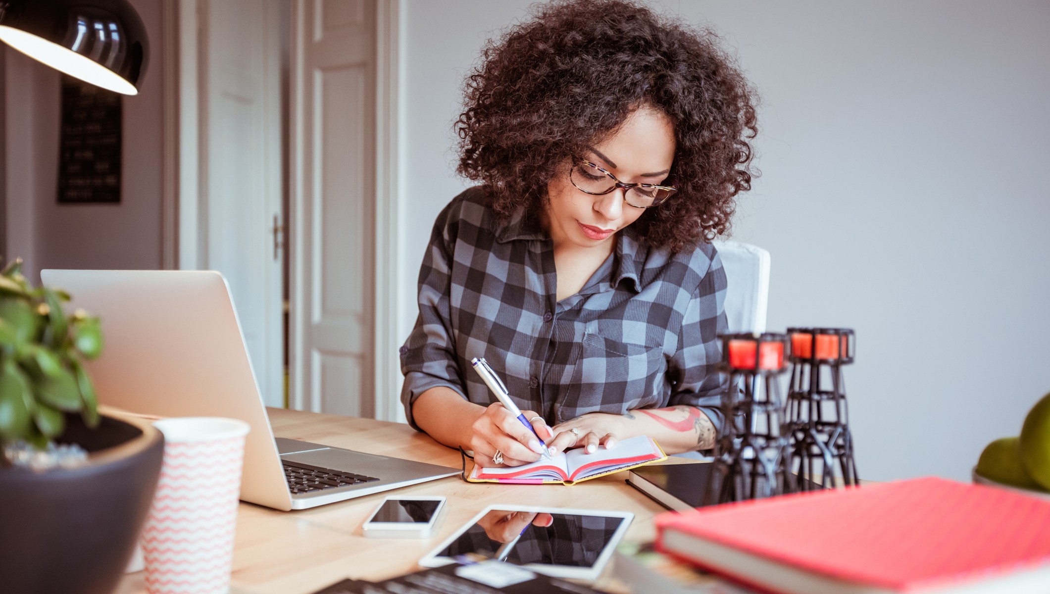 woman on laptop filing taxes