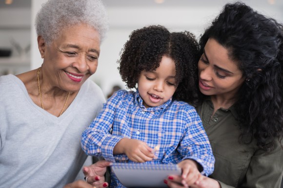 Grandma drawing with daughter and grandson