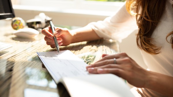 Woman looking at her payroll tax