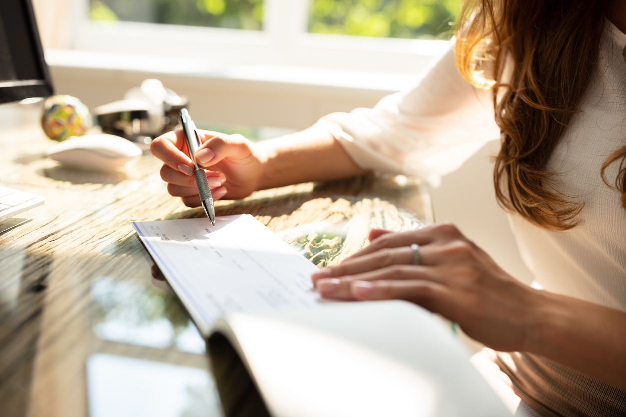 Woman looking at her payroll tax