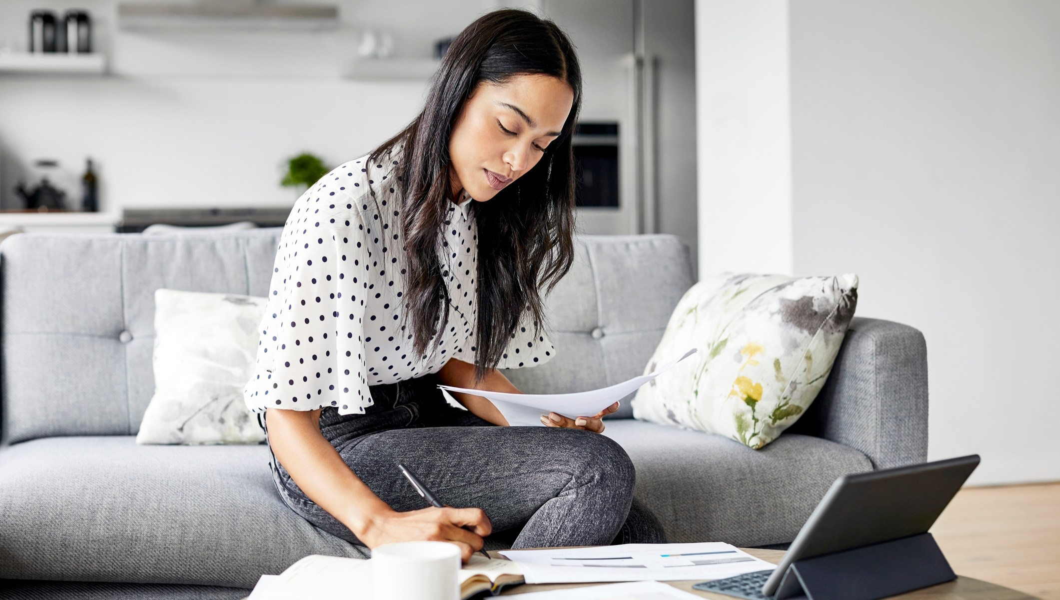 woman sitting with paper