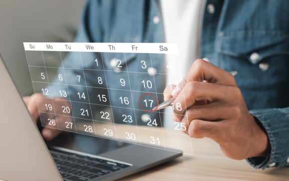 Man using digital calendar.