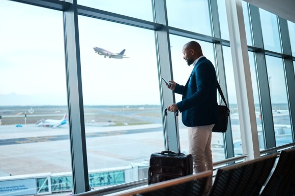 Business man waiting at airport.