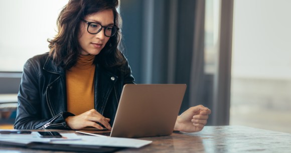 Woman using her laptop.