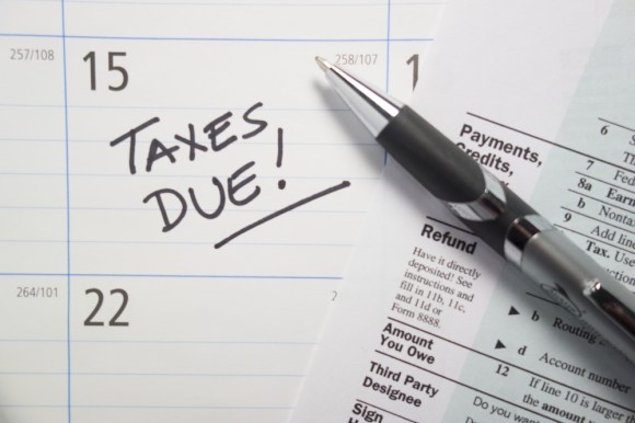 Calendar marked for tax deadline.