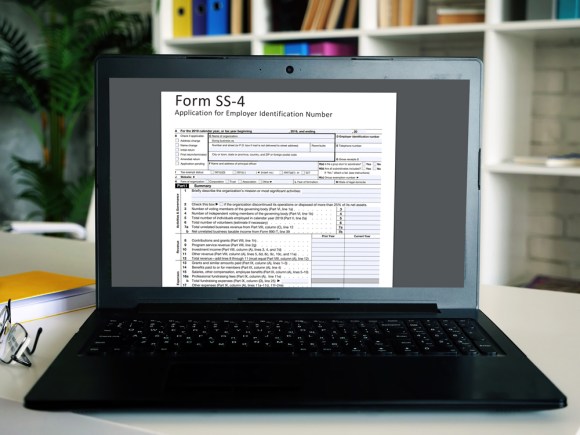 Close-up of an open laptop with a Form SS-4 form pulled up.