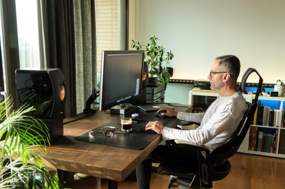 Middle-aged white man working in home office.