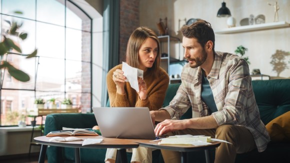 Couple discussing financial planning.