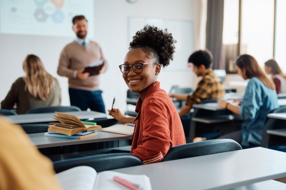 Student in classroom.
