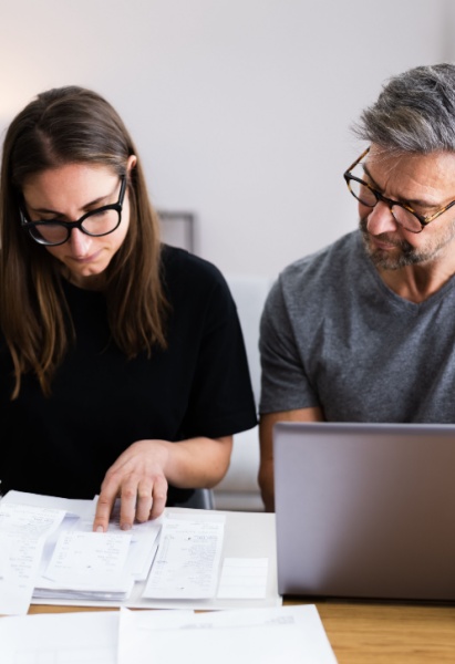 Couple Doing Taxes On Computer